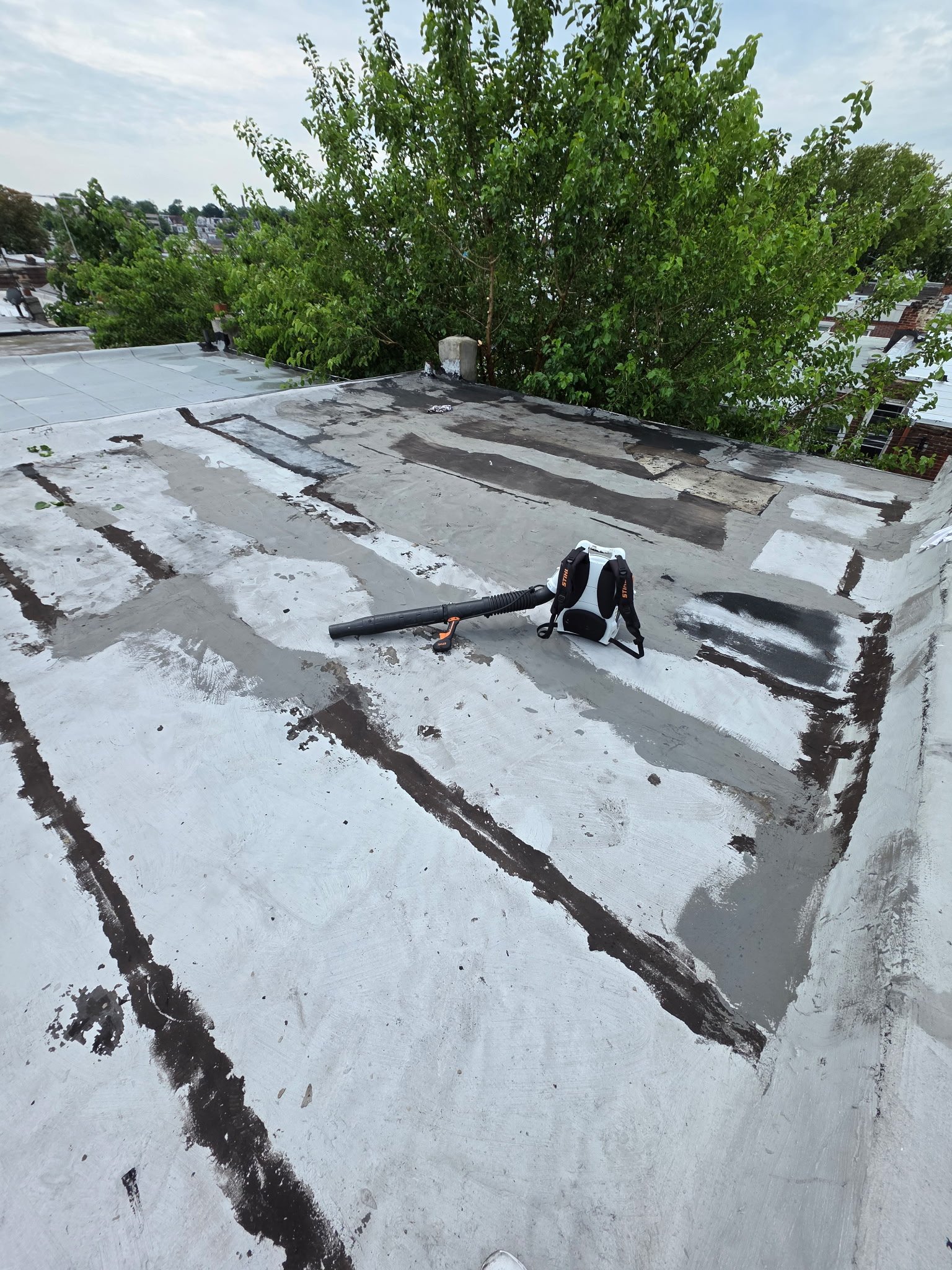 Commercial roof skylight curb flashing installation